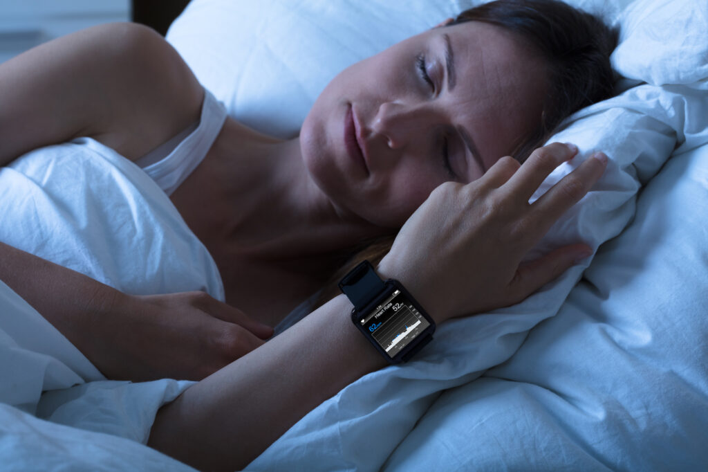 person-wearing-sleep-tracker-1024x682.jpg